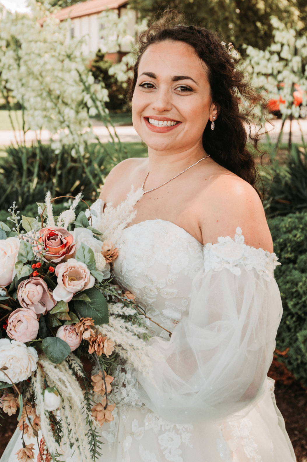 Bouquet resting in white blossoms