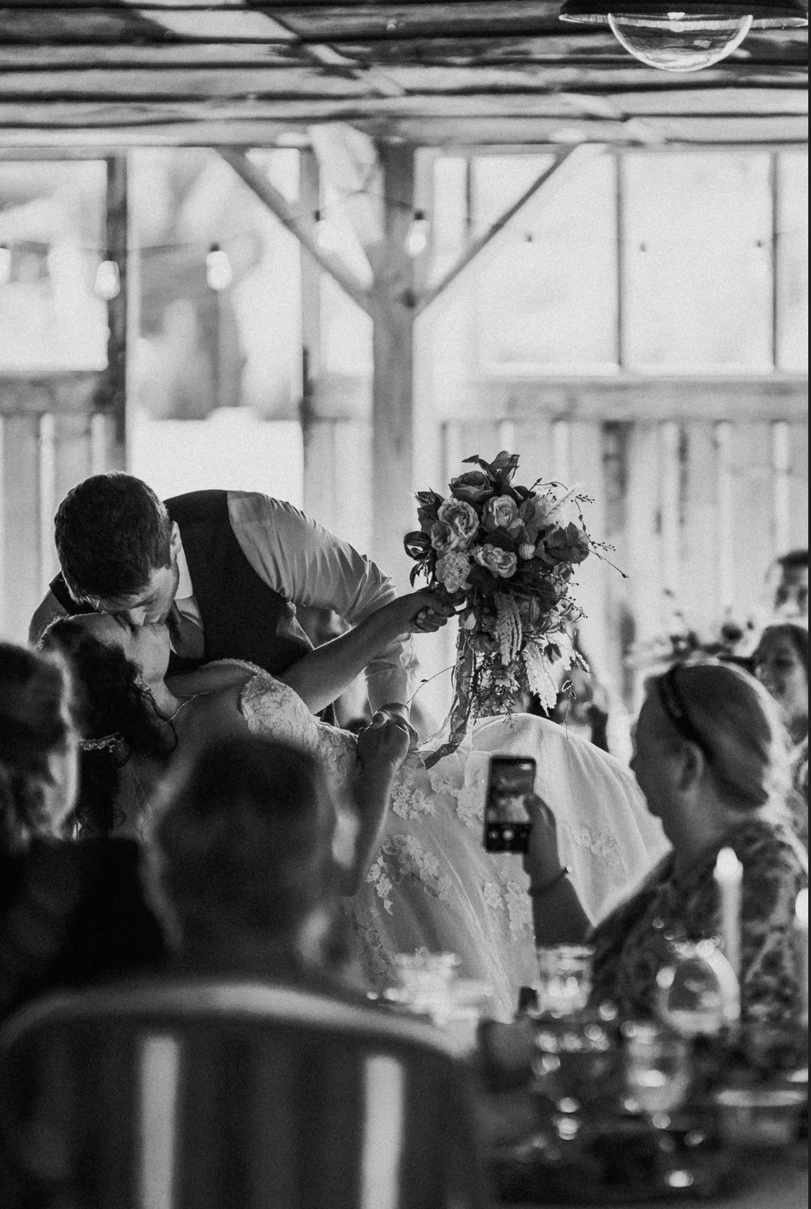 Jessie and Kurtis, black and white kiss
