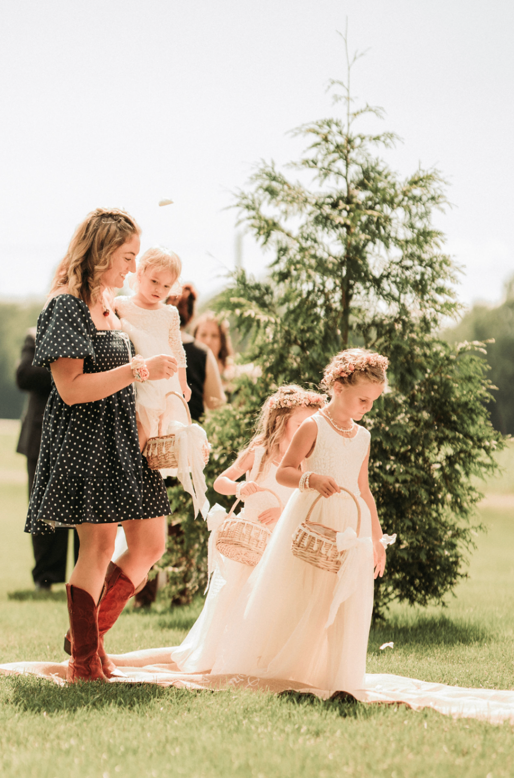 Flower girls walking down the aisle